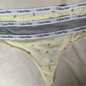 (3) Calvin Klein Yellow and Gray Underwear Set.